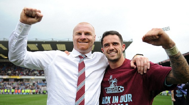 Dyche left and Danny Ings celebrate after Burnley win promotion